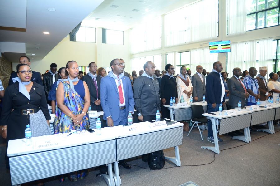  A broad spectrum of stakeholders including  staff of EAC Organs and Institutions sing the EAC Anthem before the start of commemoration ceremony 