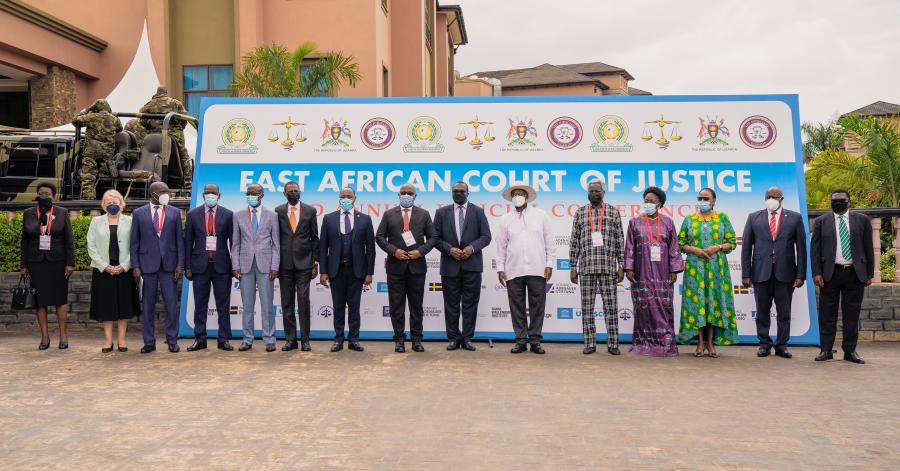 President Yoweri Museveni (6th right) in a group photo with dignitaries who graced the official closing ceremony of the 2nd Annual EACJ Judicial Conference in Kampala. 