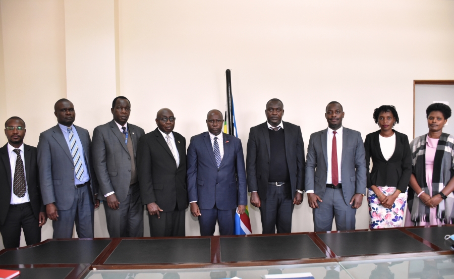 A group photo with the President of the Court Justice Nestor Kayobera (Centre) & his Vice Justice Geoffrey Kiryabwire (4th left) with the Chairperson TLS Mr George Njooka (4th right), Registrar (3rd left) with other members attending the Courtesy call.  