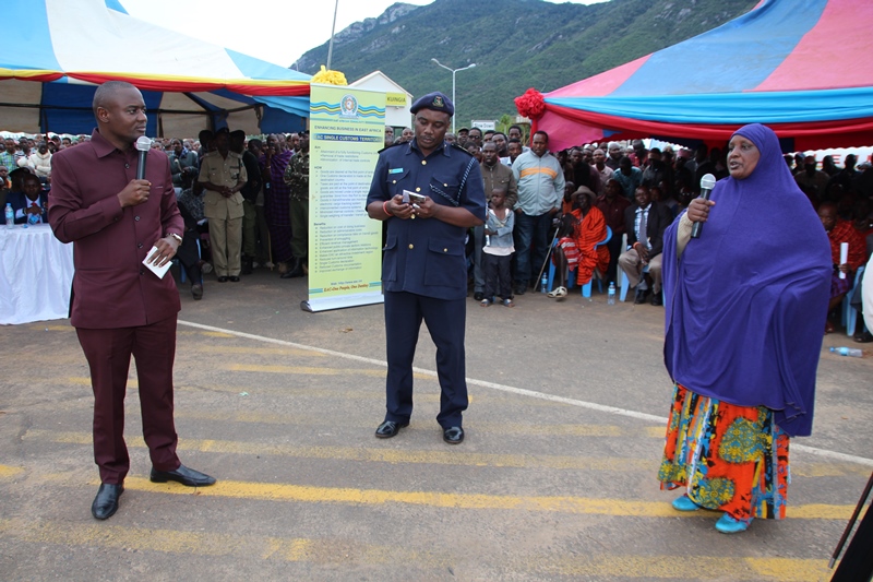 Arusha Regional Commissioner, Mr. Mrisho Gambo listen to one of  participant of the sensitization  at Namanga town