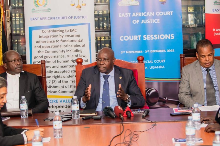 The Judge President of the EACJ, Justice Nestor Kayobera (centre) addresses a media briefing at the Commercial Court of Uganda premises. Flanking Justice Kayobera are the EACJ Principal Judge, Justice Yohane Masara (right), and Hon. Justice Stephen Mubiru, the Head of Commercial Court Division Uganda 