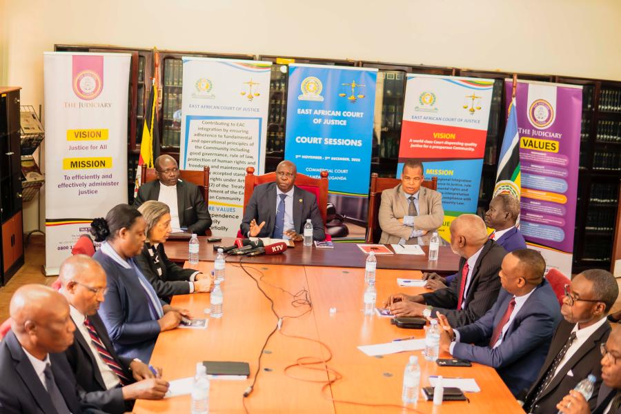 The Judge President of the EACJ, Justice Nestor Kayobera (centre) flanked by the EACJ Principal Judge, Justice Yohane Masara (right), and Hon. Justice Stephen Mubiru, the Head of the Commercial Court Division, Uganda accompanied by all the EACJ Judges brief the media on the Court’s upcoming sittings in Kampala, Uganda. 