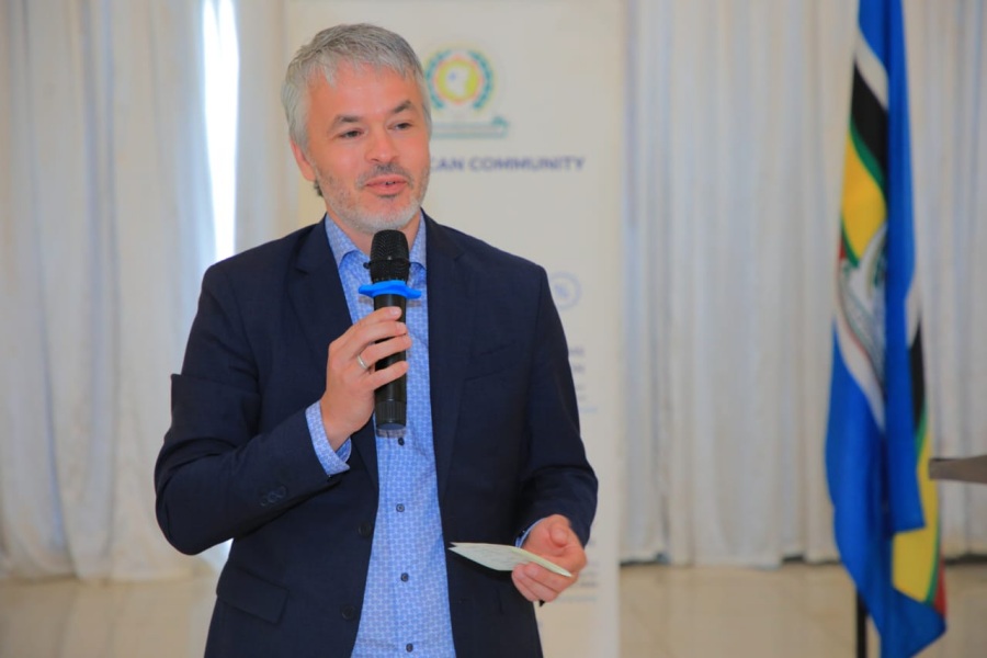 The GIZ-SEAMPEC Coordinator, Mr. Bjoern Richter, addresses EAC members of staff and other guests during the induction workshop for new EAC staff in Arusha.   