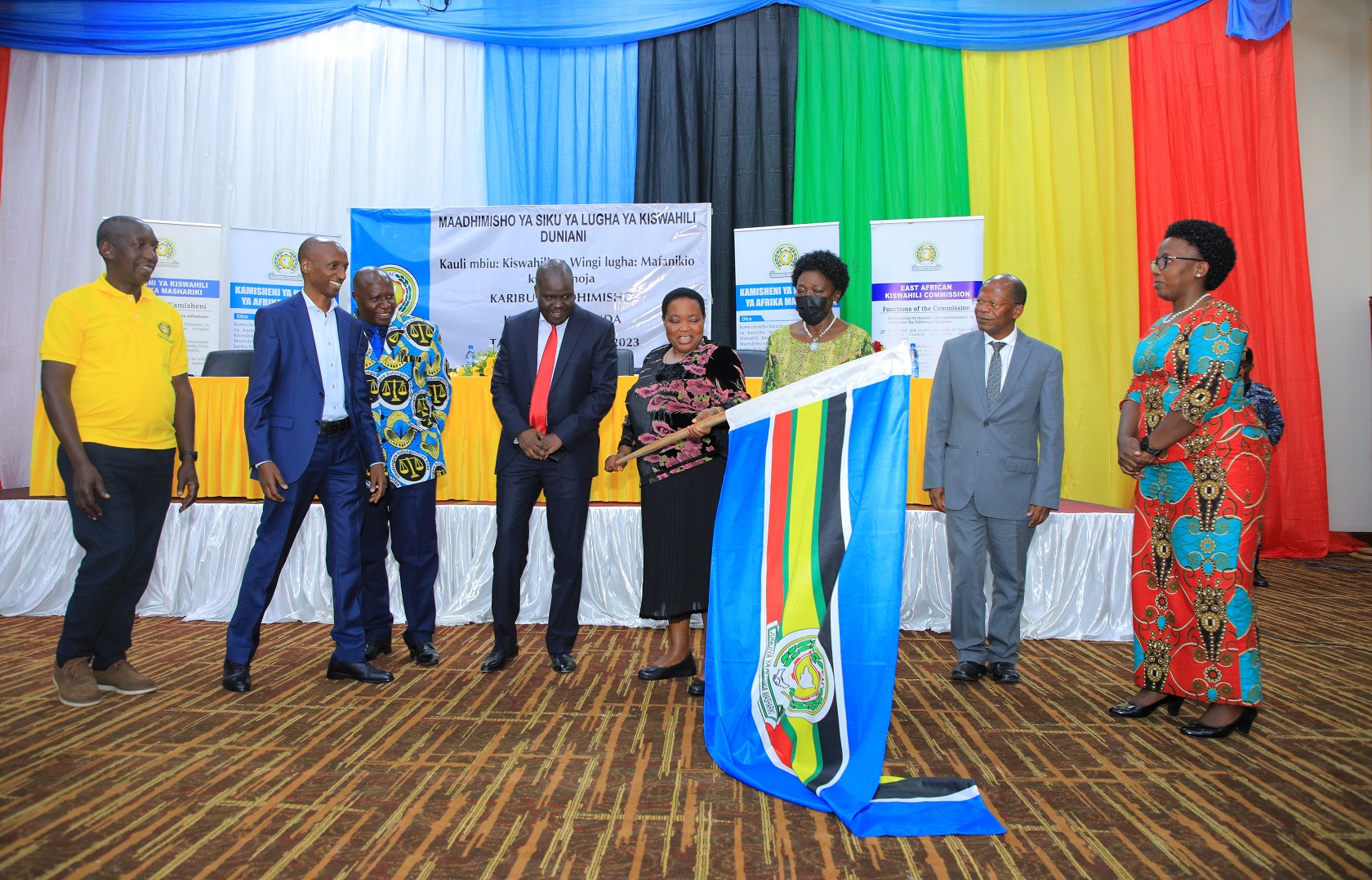 The Prime Minister of Uganda, Hon. Robinah Nabbanja, holds the EAC flag before handing over to the delegation from the Republic of Rwanda. Rwanda will be hosting the 3rd EAC Kiswahili Day celebrations in July 2024.