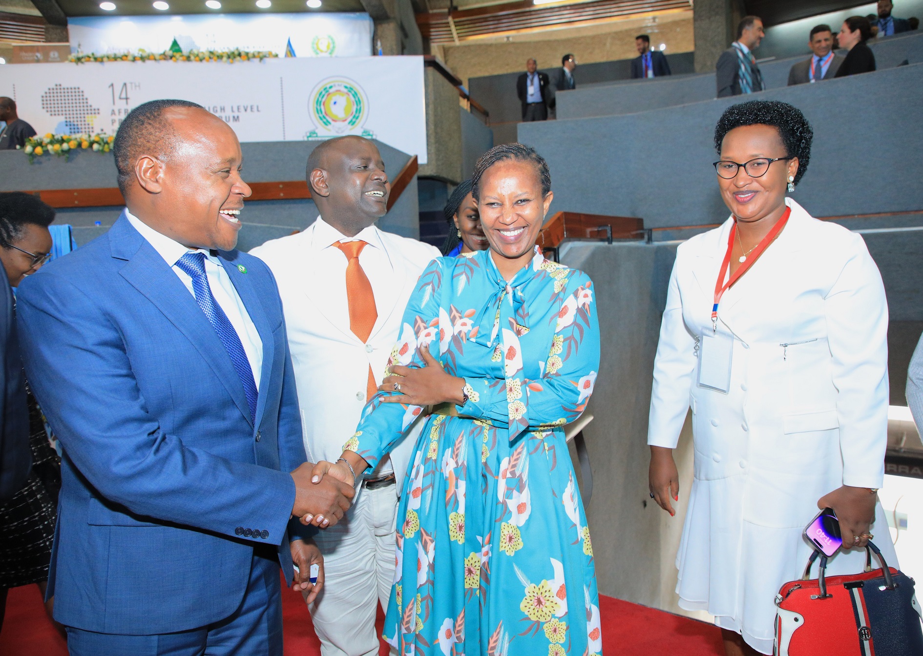 EAC Secretary General, Hon. (Dr.) Peter Mathuki (left) with Ms. Flavia Busingye (second right), the Acting Director of Customs and Trade at the Kenyatta International Convention Centre in Nairobi. Also in the picture is Mr. John Bosco Kalisa, Executive Director – East African Business Council (EABC) and Ms. Amelie Ninganza, EABC Board Member.