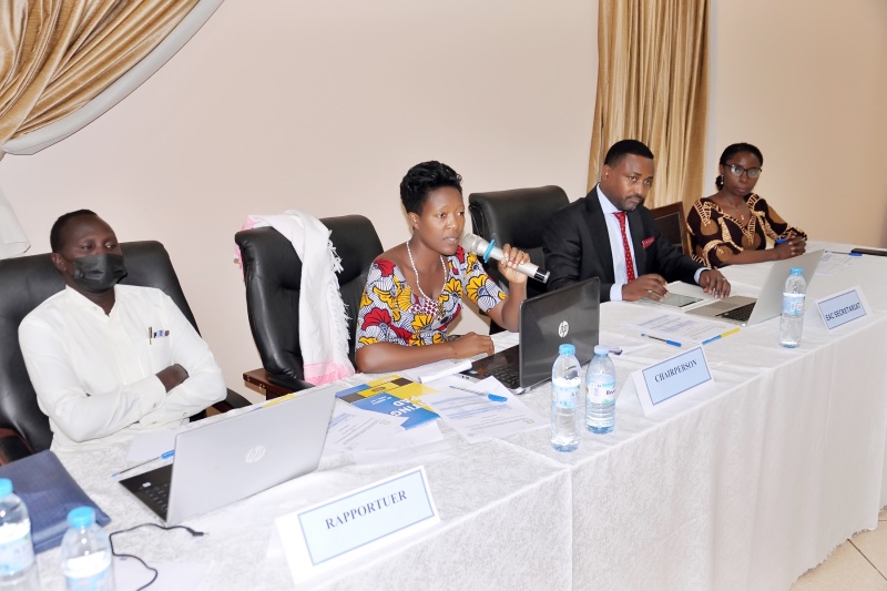 The Chairperson of the 1st EAC Regional Platform on Land, Ms. Carine Hakizimana (with mic), addressing delegates during the opening session in Kampala, Uganda. With her are (from left) the Rapporteur, Mr. Abraham Chol Ariik (Republic of South Sudan), Mr. Jean Baptiste Havugimana (Director Productive Sectors, EAC Secretariat) and Ms. Joan Kagwanja (Coordinator at the African Land Policy Centre, UN Economic Commission for Africa). 