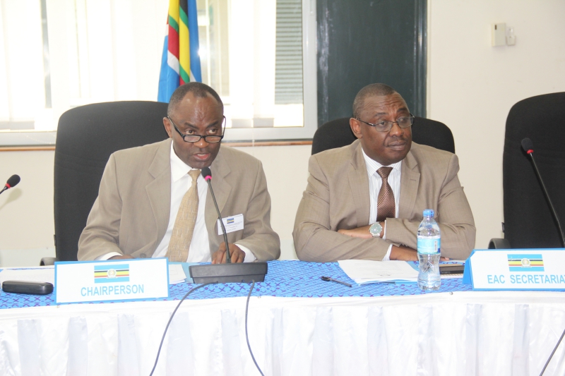 The Commissioner of Internal Trade Ministry of Trade, Industry and Cooperatives in Uganda, Mr Agaba Raymond addressing the meeting as EAC Director General Customs and Trade ,Mr Kenneth Bagamuhunda looks on.