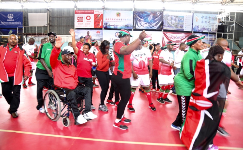 Team Kenya celebrates at the Indoor stadium after winning yesterday's volleyball matches
