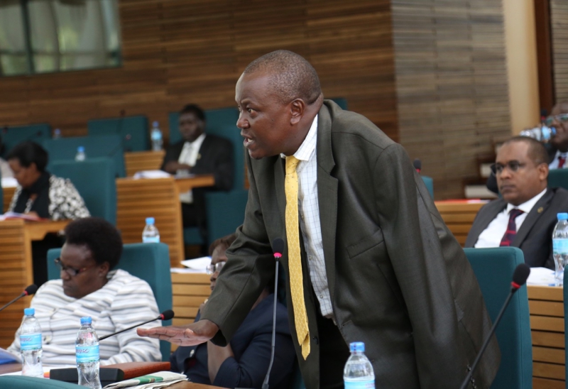 Hon Mathias Kasamba speaks to an attentive House earlier today