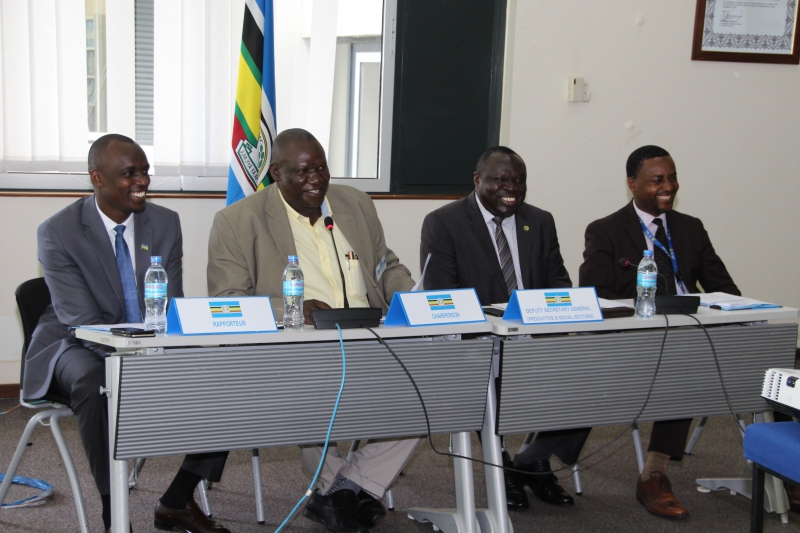 The Chairperson of the 5th Sectoral Council on Environment and Natural Resources, Mr. Mugabi Stephen David, speaking at the opening session of the meeting. With him are, from left, Mr. Jean Kizito of the Rwanda High Commission; Hon. Christophe Bazivamo, EAC Deputy Secretary General in charge of Productive and Social Sectors, and; Mr. Jean Baptiste Havugimana, Director Productive Sectors at the EAC Secretariat. 