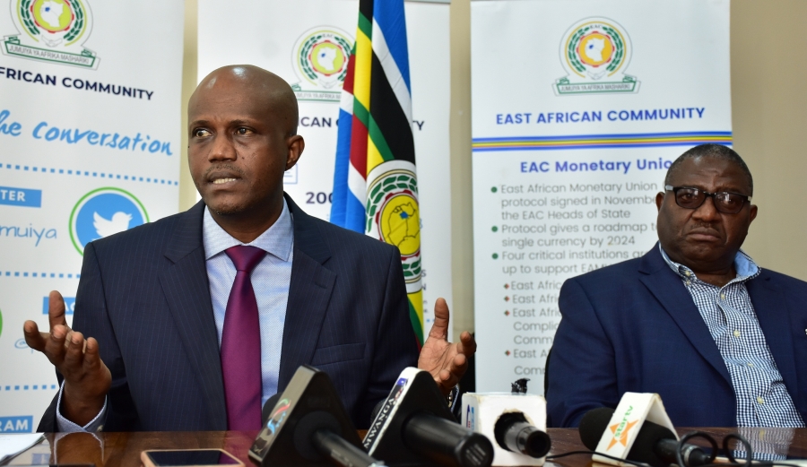 EAC Secretary General Amb. Liberat Mfumukeko addressing a media briefing at the EAC Headquarters in Arusha, Tanzania shortly before he unveiled the EAC 20th Anniversary Logo. With him is the Deputy Secretary General in charge of Planning and Infrastructure, Eng. Steven Mlote.