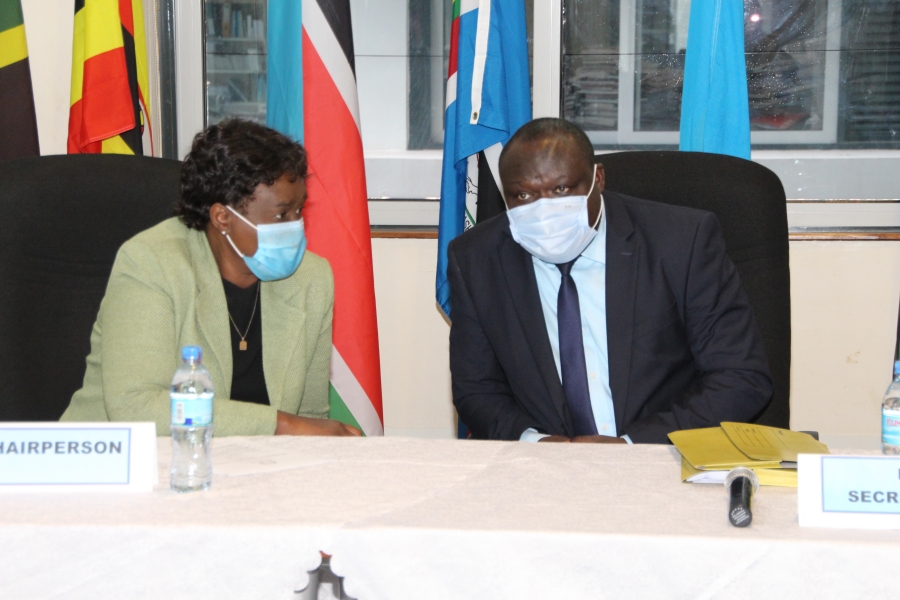 The Chairperson of the Session of Senior Officials at the 31st Meeting of the Sectoral Council of Ministers of EAC Affairs, Dr. Alice Yalla from Kenya, confers with the EAC Deputy Secretary General in charge of Productive and Social Sectors, Hon. Christophe Bazivamo at the EAC Headquarters in Arusha, Tanzania. 