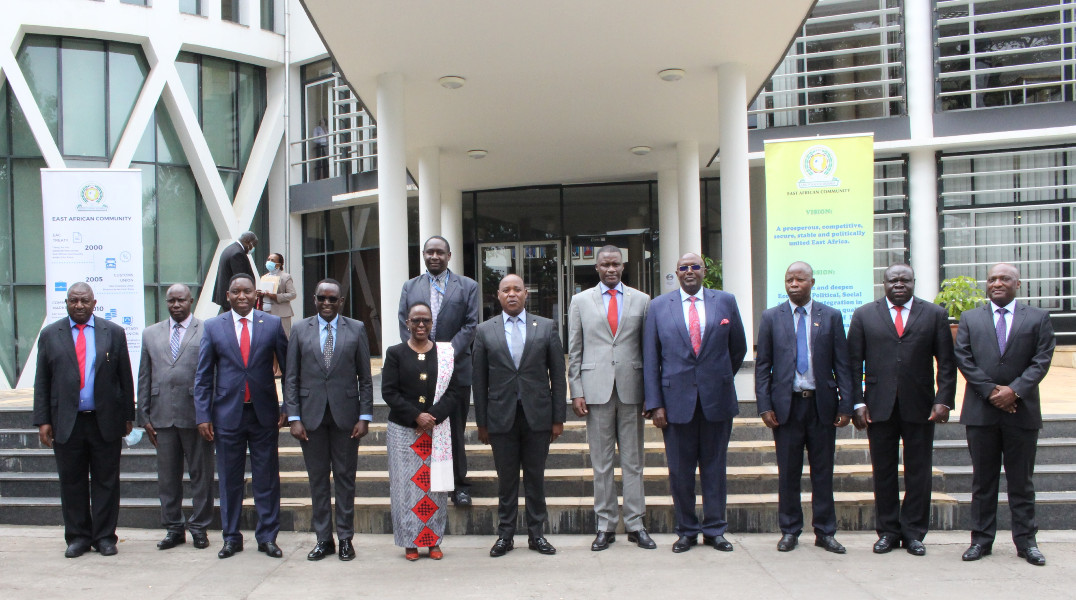 Tanzania’s Minister for Foreign Affairs and East African Cooperation, Hon. Amb. Liberata Mulamula, in a group photo with EAC Secretary General Hon. Dr. Peter Mathuki, EAC High Commissioners to Tanzania, EALA Speaker Hon. Ngoga Martin and EAC Executives outside the EAC Headquarters in Arusha.