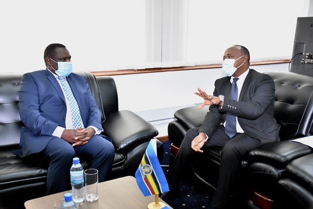 EAC Secretary General, Hon. Peter Mathuki in discussion with Mr Chibebe of ILO