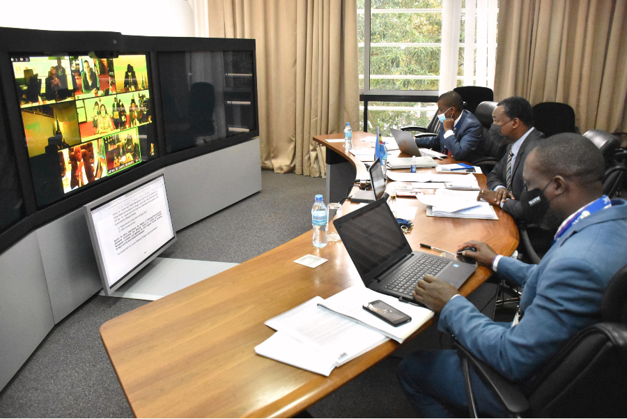  Staff from the EAC Secretariat (L-R) Mr. Raphael Manirabarusha, Tourism Programme Assistant, Mr.Jean Baptiste Havugimana, Director of Productive Sectors and Simon Kiarie, Principal Tourism Officer follow the proceedings of the Sectoral Council 