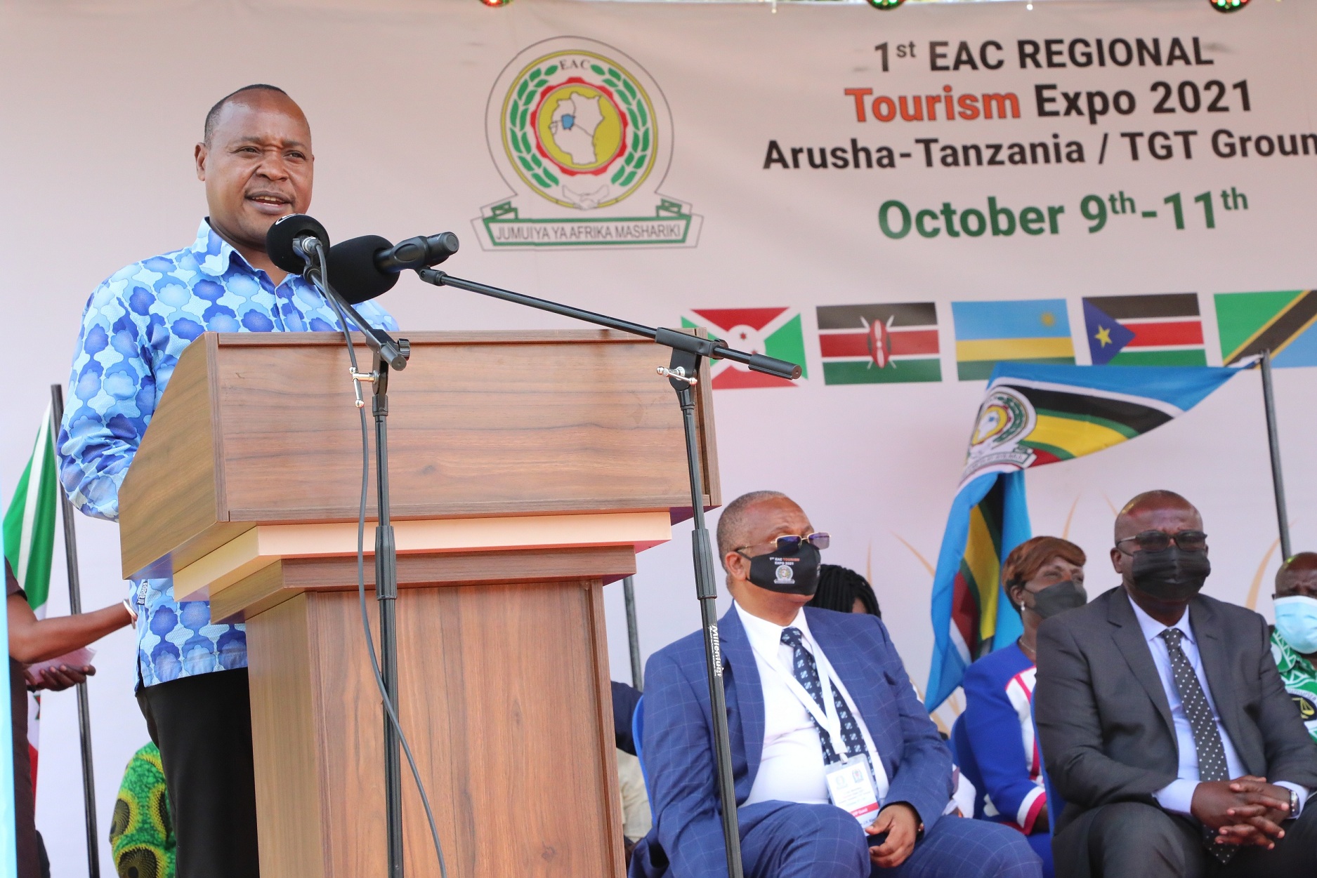 EAC Secretary General Hon. (Dr.) Peter Mathuki addresses guests and exhibitors when he officiated over the official opening of the 1st EAC Tourism Expo at the TGT Grounds in Arusha, Tanzania.
