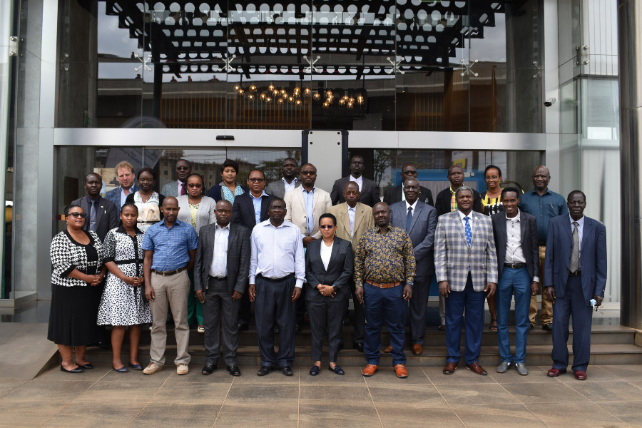 A group photo of the participants of the 9th Regional Steering Committee Meeting of the EAC Regional Network of Public Health Reference Laboratories for Communicable Diseases (EAC – RNPHRL) . 