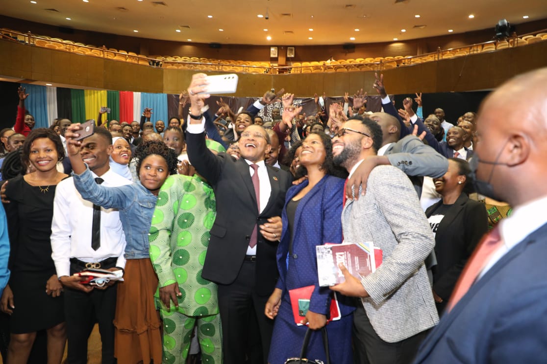 Selfie time: H.E Jakaya Kikwete  during a selfie moment with a group of young people shortly  after the opening session of the YouLead Summit 2021
