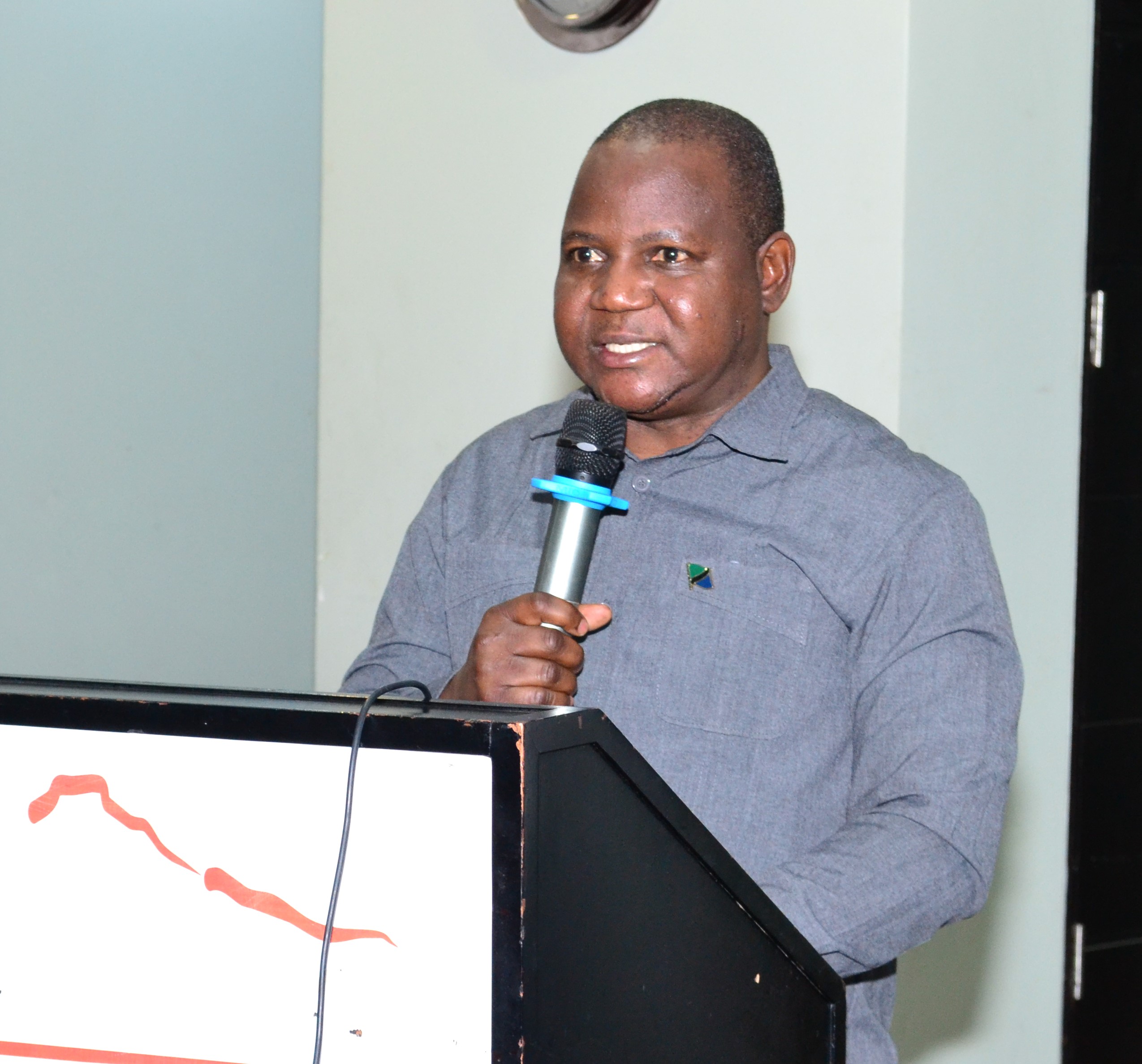 Deputy Permanent Secretary in Prime Minister’s Office Kaspar Mmuya makes opening remarks for national validation meeting of the regional One Health Strategy in Arusha. 