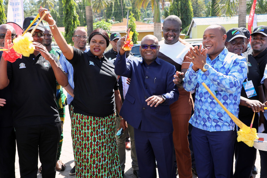 Prof. Kitila Mkumbo, Minister of Industry and Trade cuts the ribbon to officially open the 21st MSMEs Trade Fair